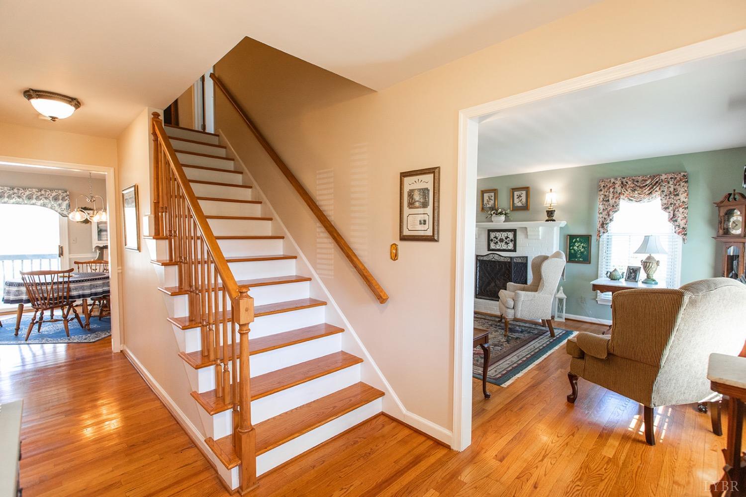 115 Hunters Creek Road Forest, VA 24551 - Photo 7 of 43 a view of entryway and hall with wooden floor