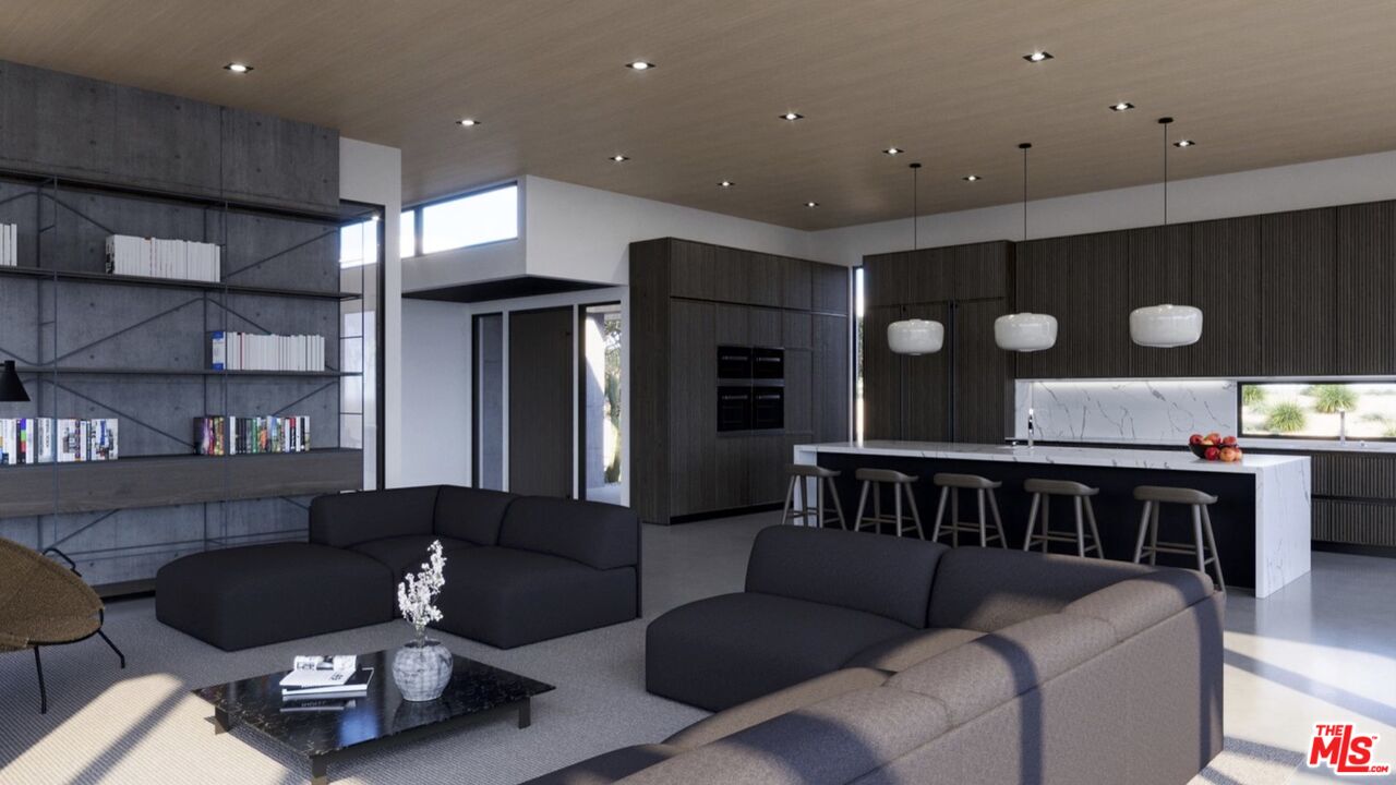 6658 Wandermere Road Malibu, CA 90265 - Photo 9 of 21 a living room with furniture and kitchen view