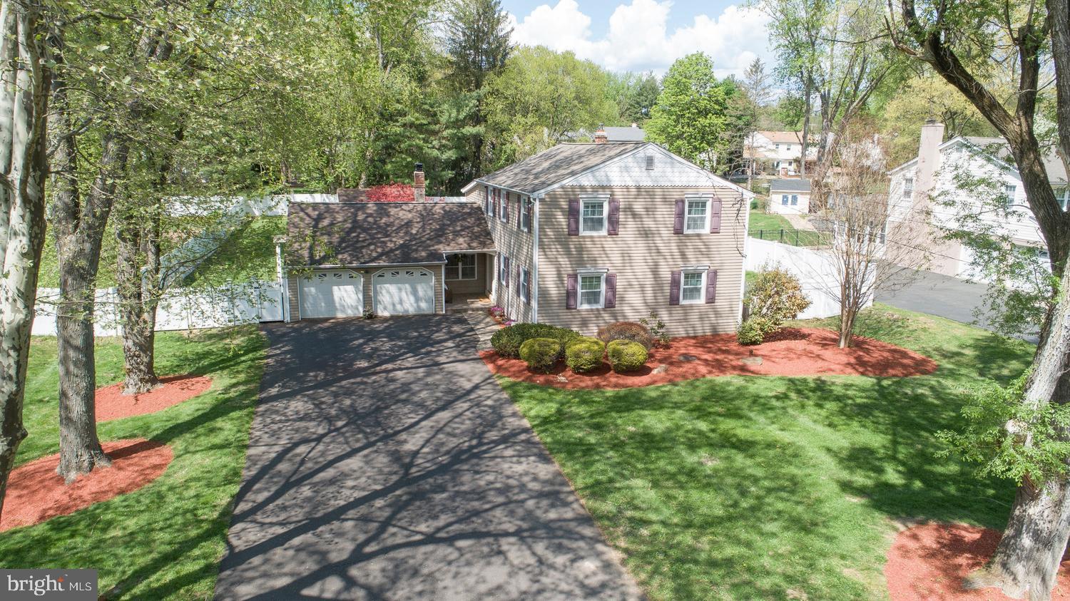 251 Upper Holland Road Richboro, PA 18954 - Photo 1 of 41 a view of a house with a yard and garden
