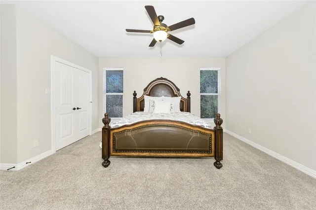 a room with a ceiling fan