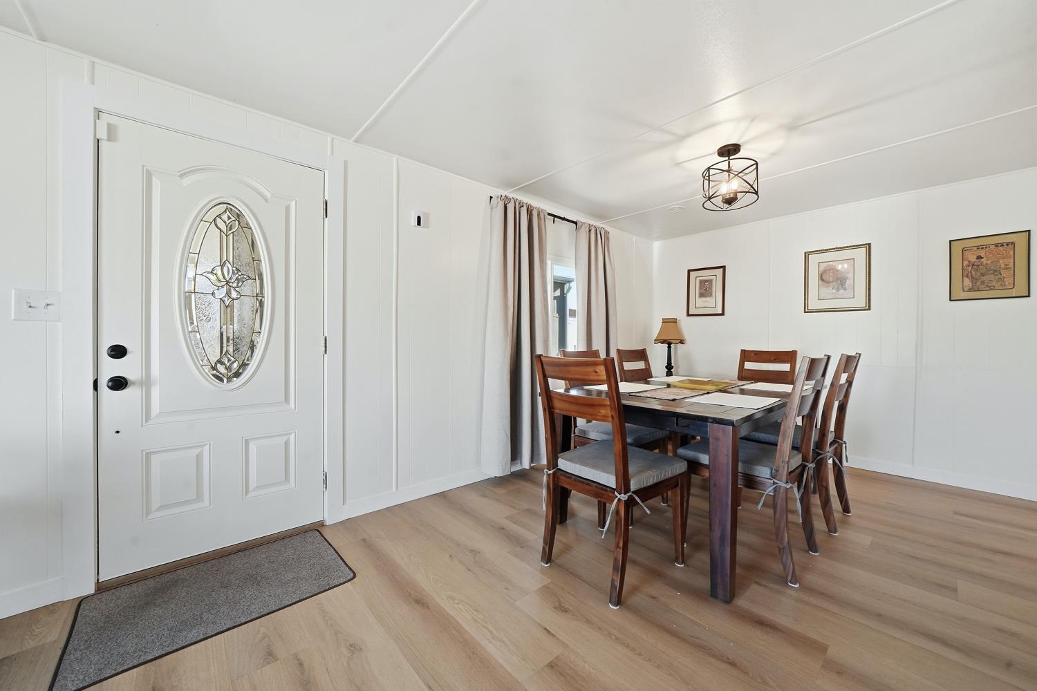 59 Oneida Street Oakley, CA 94561 - Photo 12 of 45 a view of a dining room with furniture and wooden floor