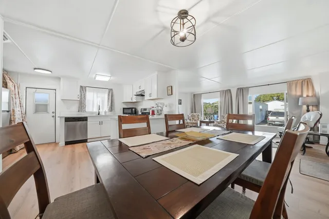 a view of a dining room kitchen and a window