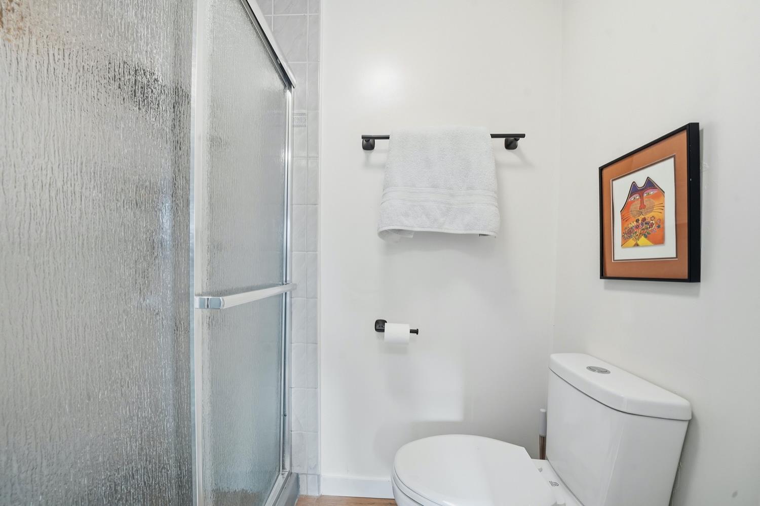 59 Oneida Street Oakley, CA 94561 - Photo 19 of 45 a white toilet sitting next to a bathroom sink