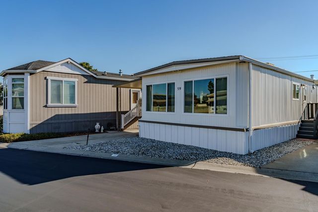 a front view of a house with windows