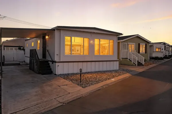 a view of a house with a porch