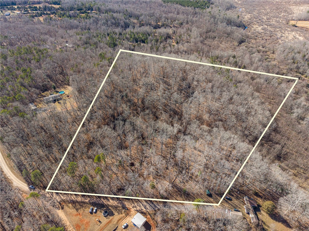 247 Stallion Drive Honea Path, SC 29654 - Photo 2 of 19 This expansive, wooded lot offers an opportunity for peaceful living amidst natural surroundings.