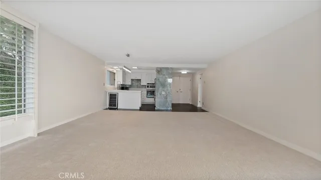 a view of a kitchen with a sink