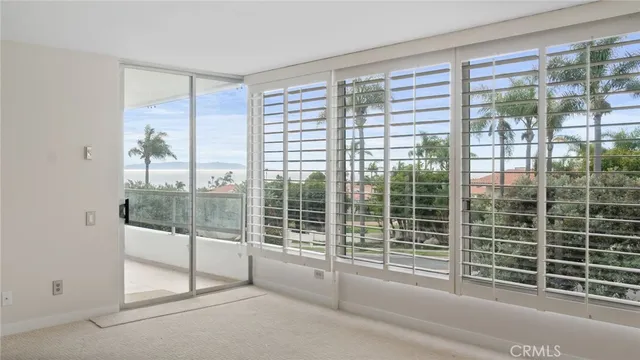 a large kitchen with a refrigerator a sink and a stove