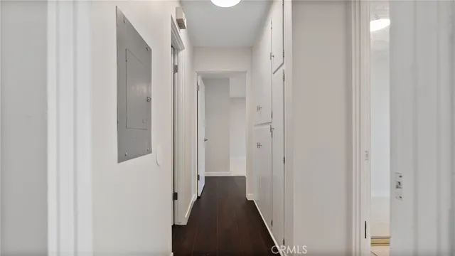 a view of an empty room with glass door