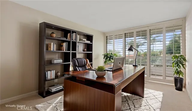 a room with furniture and a window