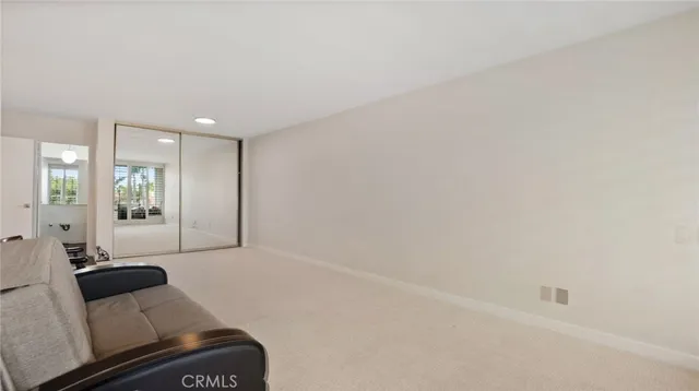 a bathroom with a shower and a mirror
