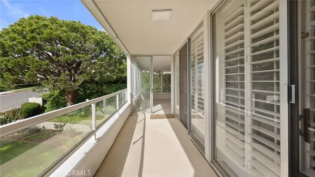 an aerial view of residential houses with city view