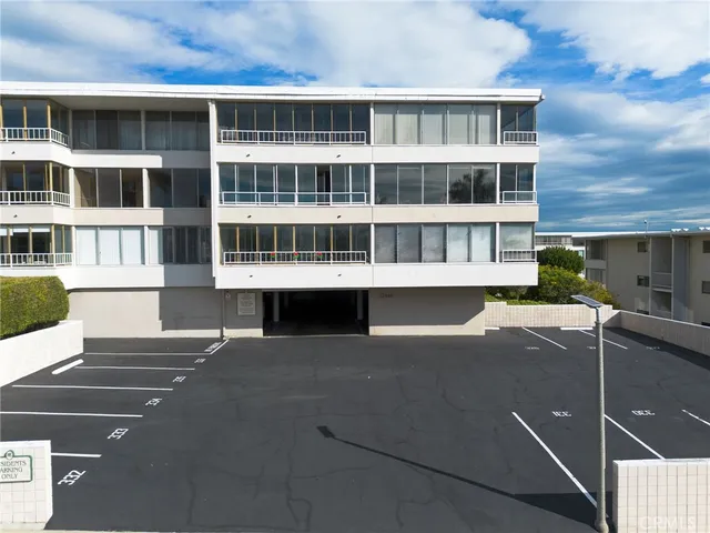 an aerial view of a house with a ocean view