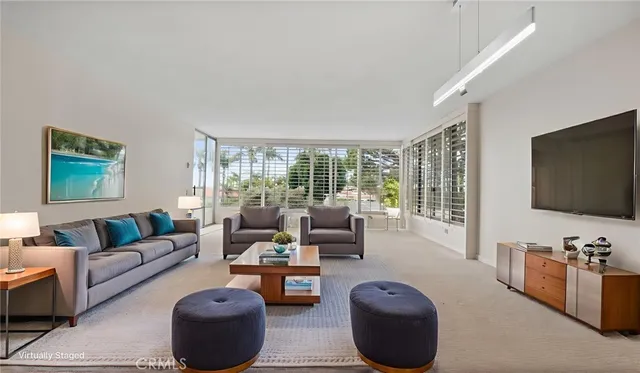 a view of a big room with an empty room and windows