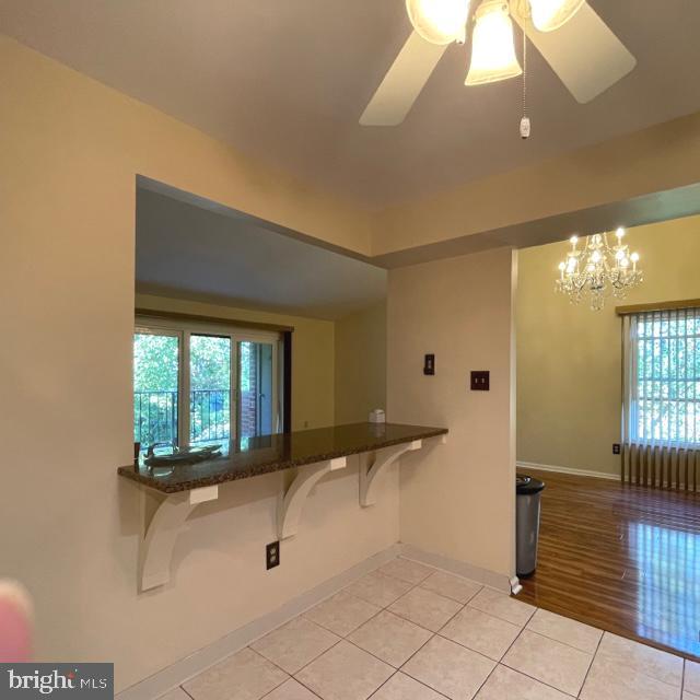 2015 Welsh Road, Unit A24 Philadelphia, PA 19115 - Photo 11 of 29 a room with gym equipment and view of living room