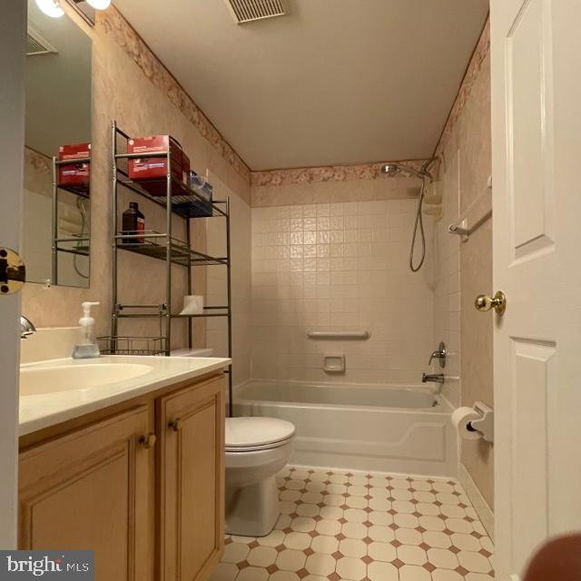 2015 Welsh Road, Unit A24 Philadelphia, PA 19115 - Photo 16 of 29 a bathroom with a sink a toilet and shower