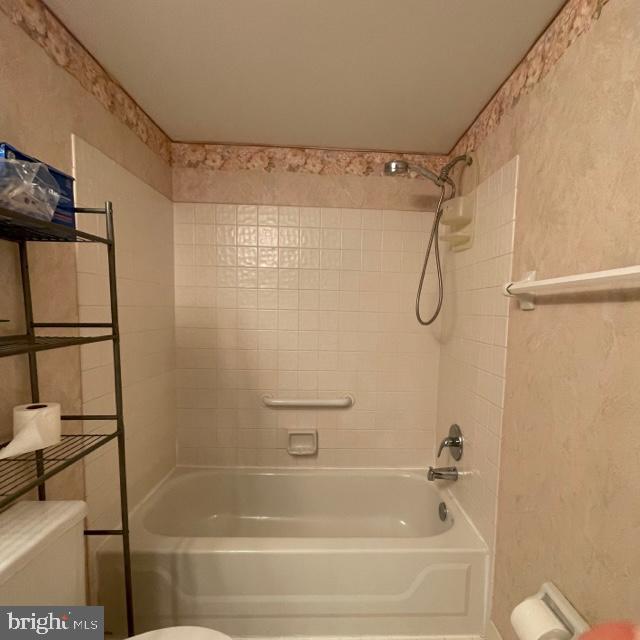 2015 Welsh Road, Unit A24 Philadelphia, PA 19115 - Photo 17 of 29 a bathroom with a shower and a bath tub