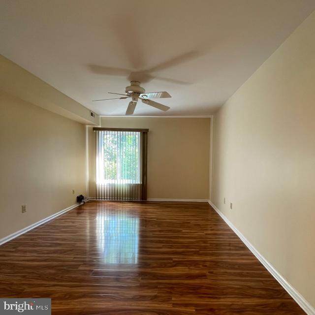 2015 Welsh Road, Unit A24 Philadelphia, PA 19115 - Photo 20 of 29 a view of empty room with wooden floor and fan