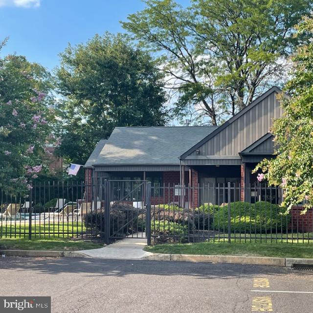 2015 Welsh Road, Unit A24 Philadelphia, PA 19115 - Photo 28 of 29 a front view of a house with a garden