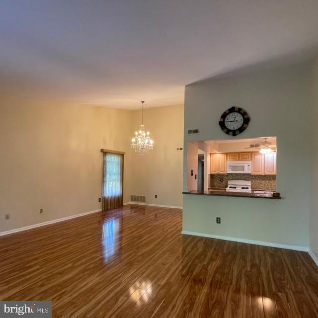 2015 Welsh Road, Unit A24 Philadelphia, PA 19115 - Photo 7 of 29 a view of a room with wooden floor and window