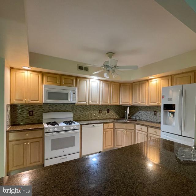 2015 Welsh Road, Unit A24 Philadelphia, PA 19115 - Photo 9 of 29 a kitchen with stainless steel appliances granite countertop a stove a sink and a refrigerator