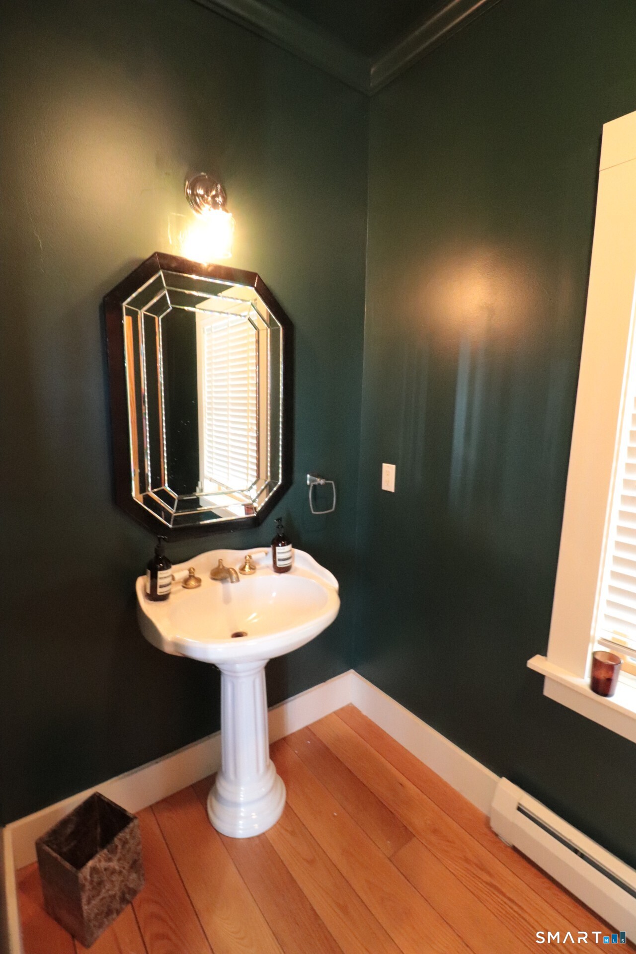 68 Hopkins Road Warren, CT 06777 - Photo 12 of 30 a bathroom with a sink and a mirror