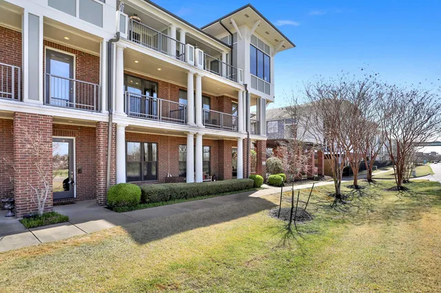 a house with swimming pool in front of it