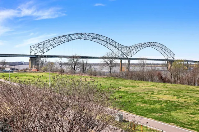 a view of swimming pool with a yard