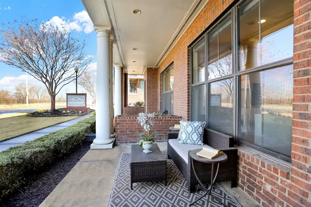 a building outdoor space with patio and outdoor seating