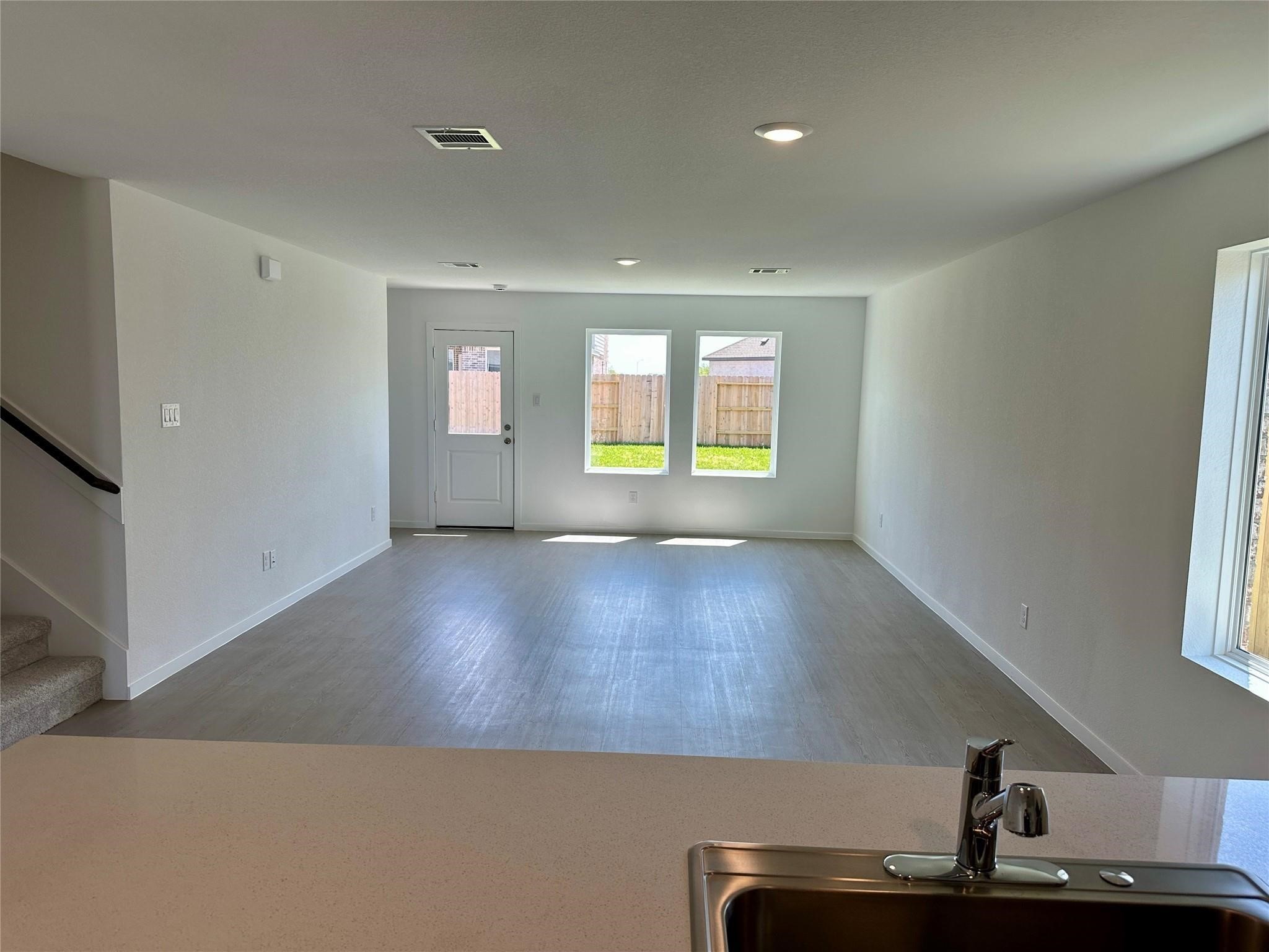 16511 Ithaca Pheasant Drive New Caney, TX 77357 - Photo 5 of 31 a view of room with window and wooden floor