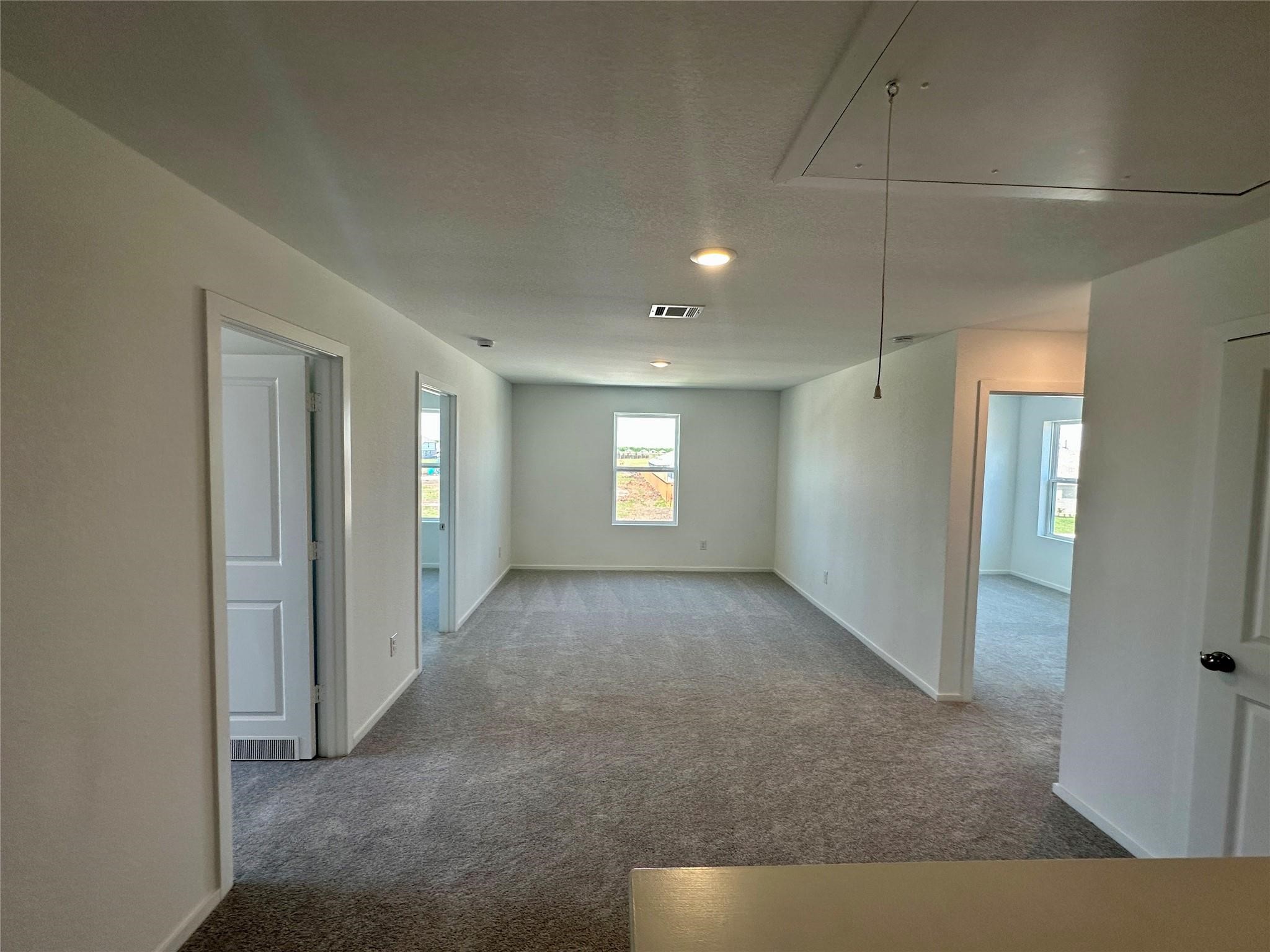 16511 Ithaca Pheasant Drive New Caney, TX 77357 - Photo 6 of 31 a view of a big room with windows and closet