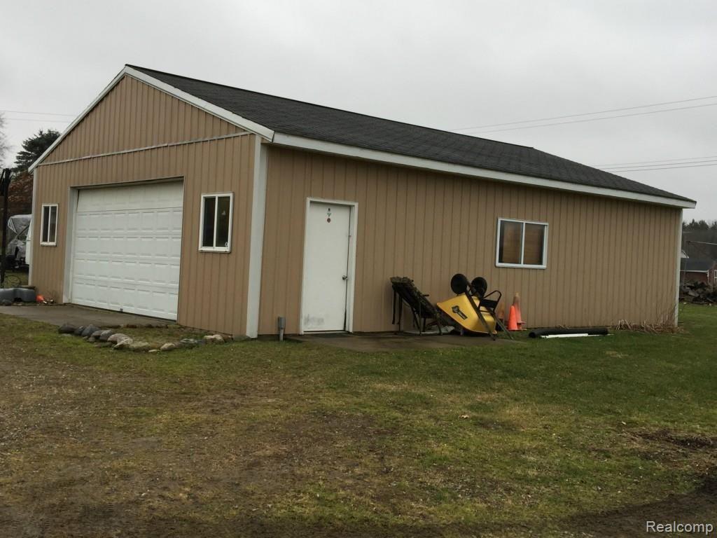 7305 Crofoot Road Fowlerville, MI 48836 - Photo 23 of 36 30x 40 pole barn for all your hobbies, storage, or toys.