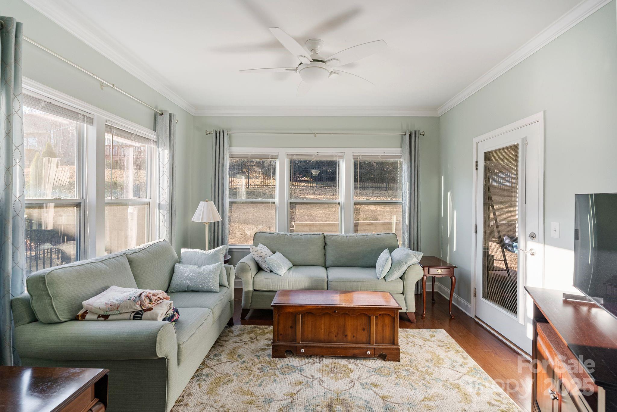 2304 Celandine Way Tega Cay, SC 29708 - Photo 20 of 47 a living room with furniture and a window