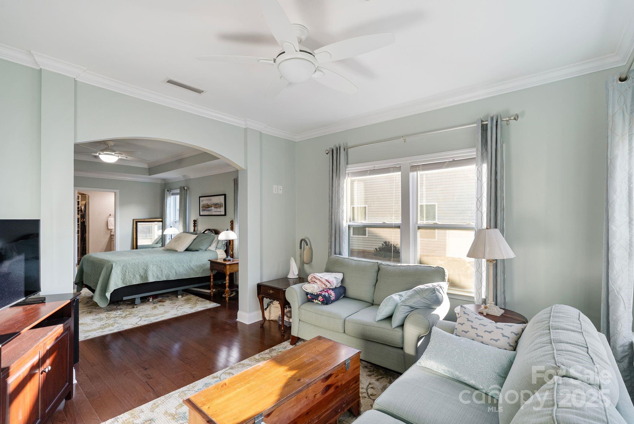 2304 Celandine Way Tega Cay, SC 29708 - Photo 21 of 47 a living room with furniture and a large window