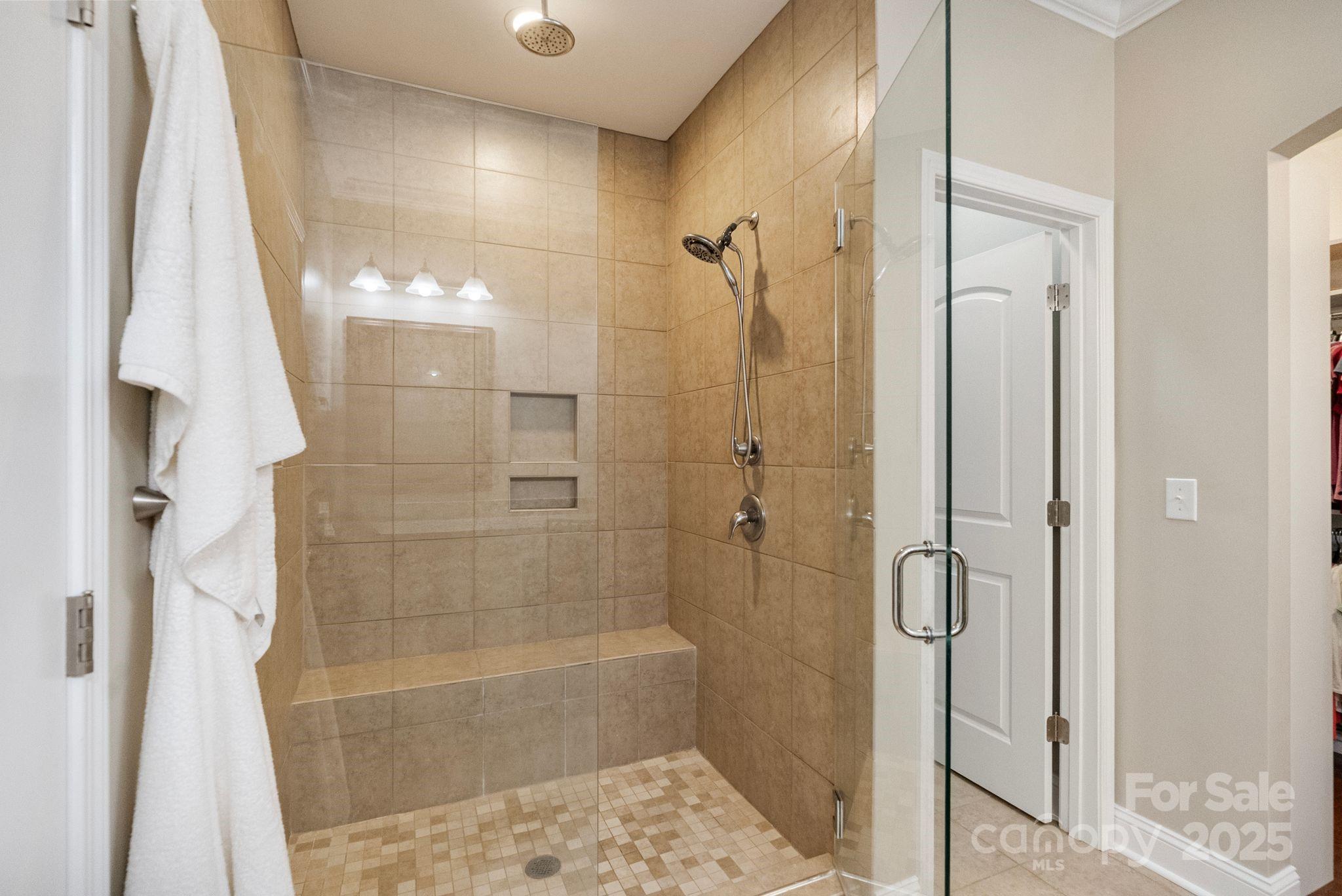 2304 Celandine Way Tega Cay, SC 29708 - Photo 24 of 47 a bathroom with a shower