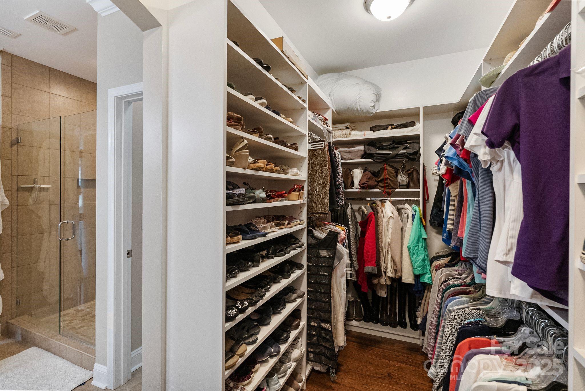 2304 Celandine Way Tega Cay, SC 29708 - Photo 25 of 47 a view of walk in closet with clothes