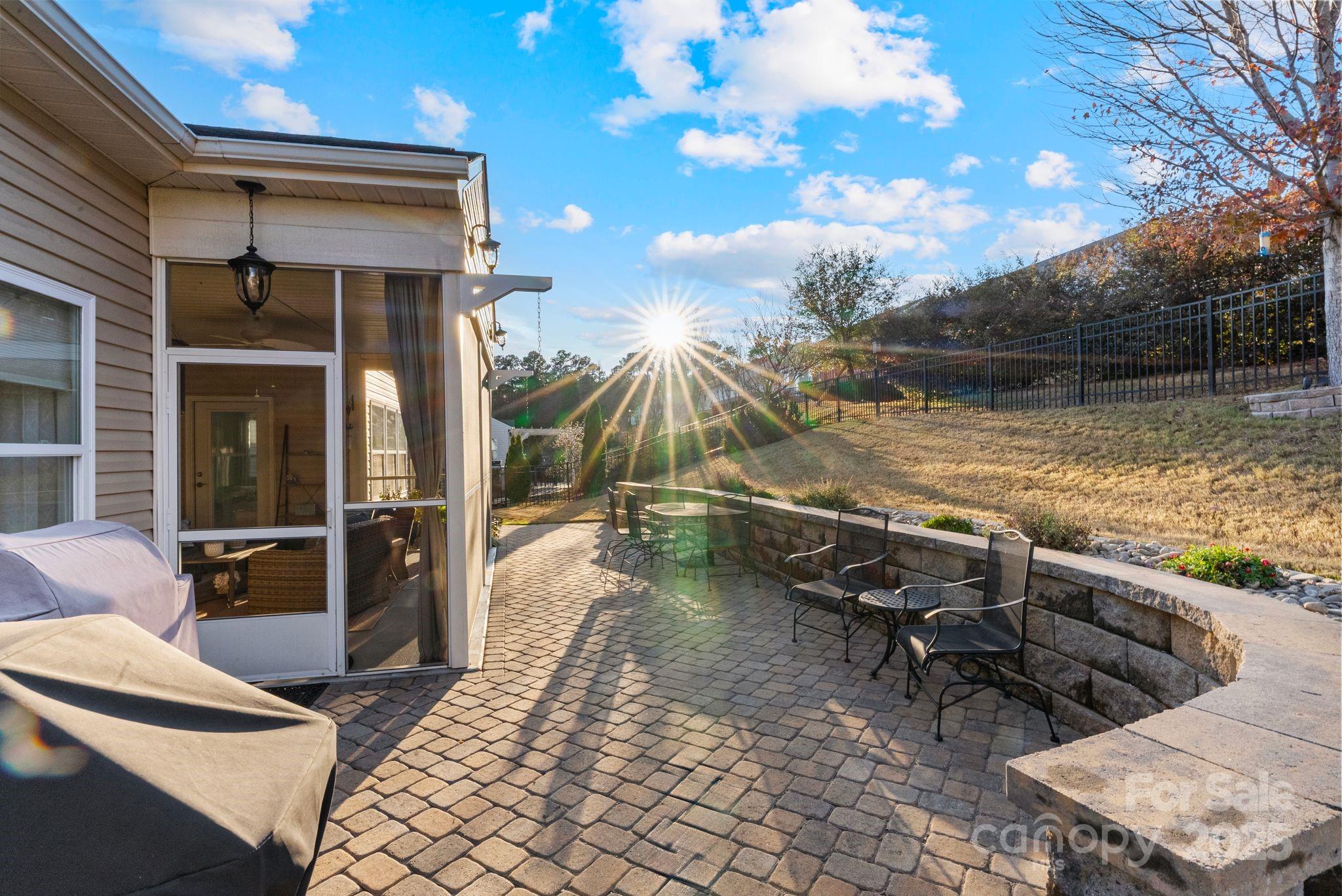 2304 Celandine Way Tega Cay, SC 29708 - Photo 39 of 47 a view of a backyard with plants and lake view