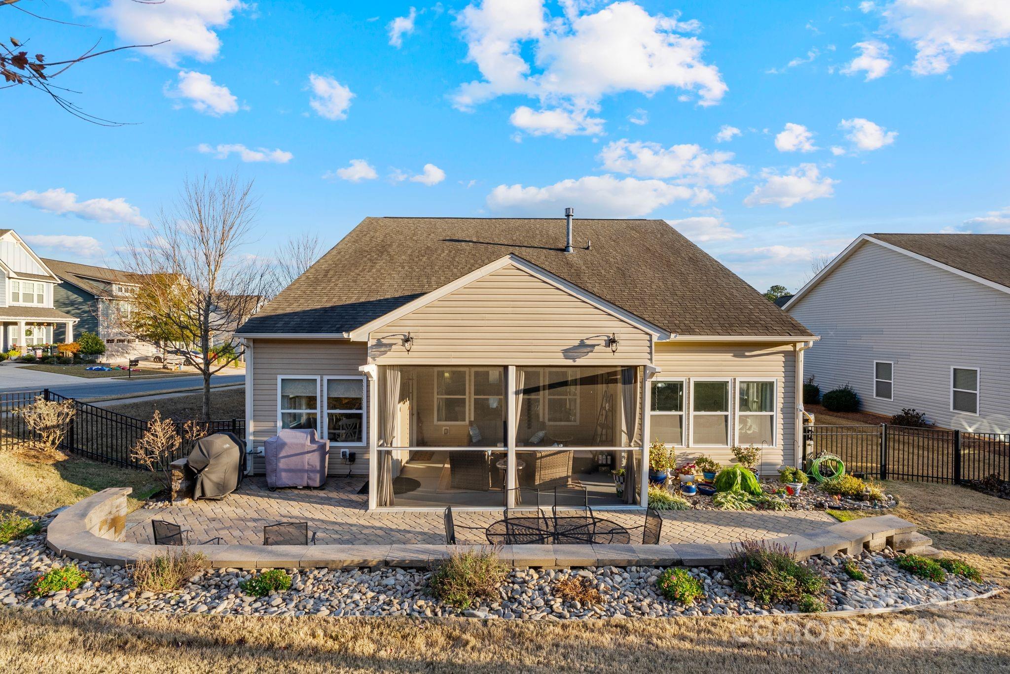 2304 Celandine Way Tega Cay, SC 29708 - Photo 40 of 47 a front view of a house with garden