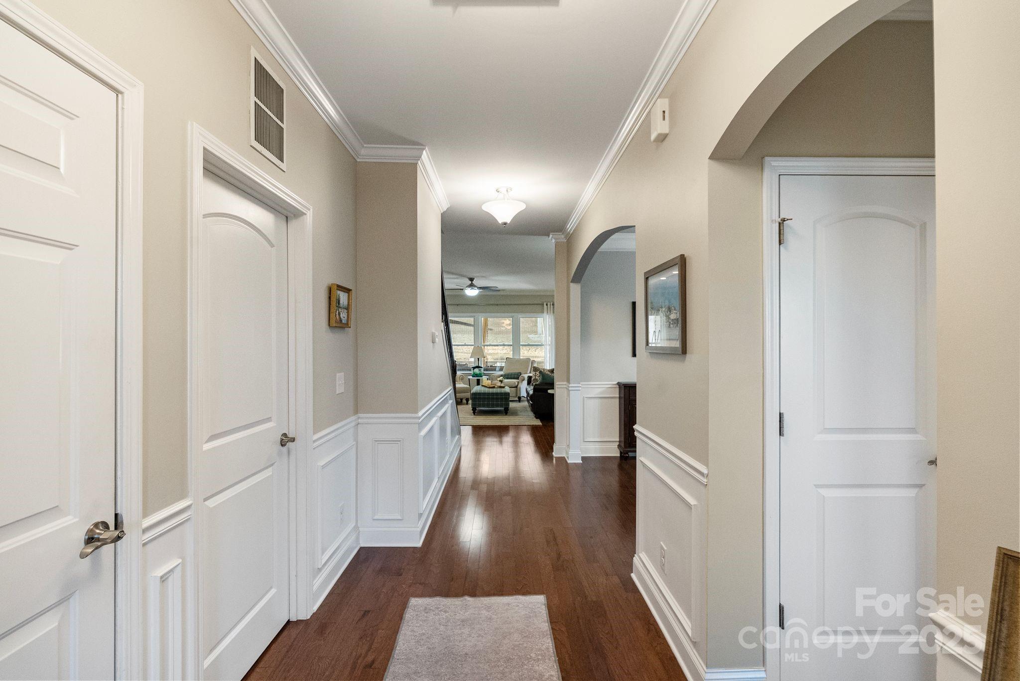 2304 Celandine Way Tega Cay, SC 29708 - Photo 8 of 47 a view of a hallway to a livingroom and furniture