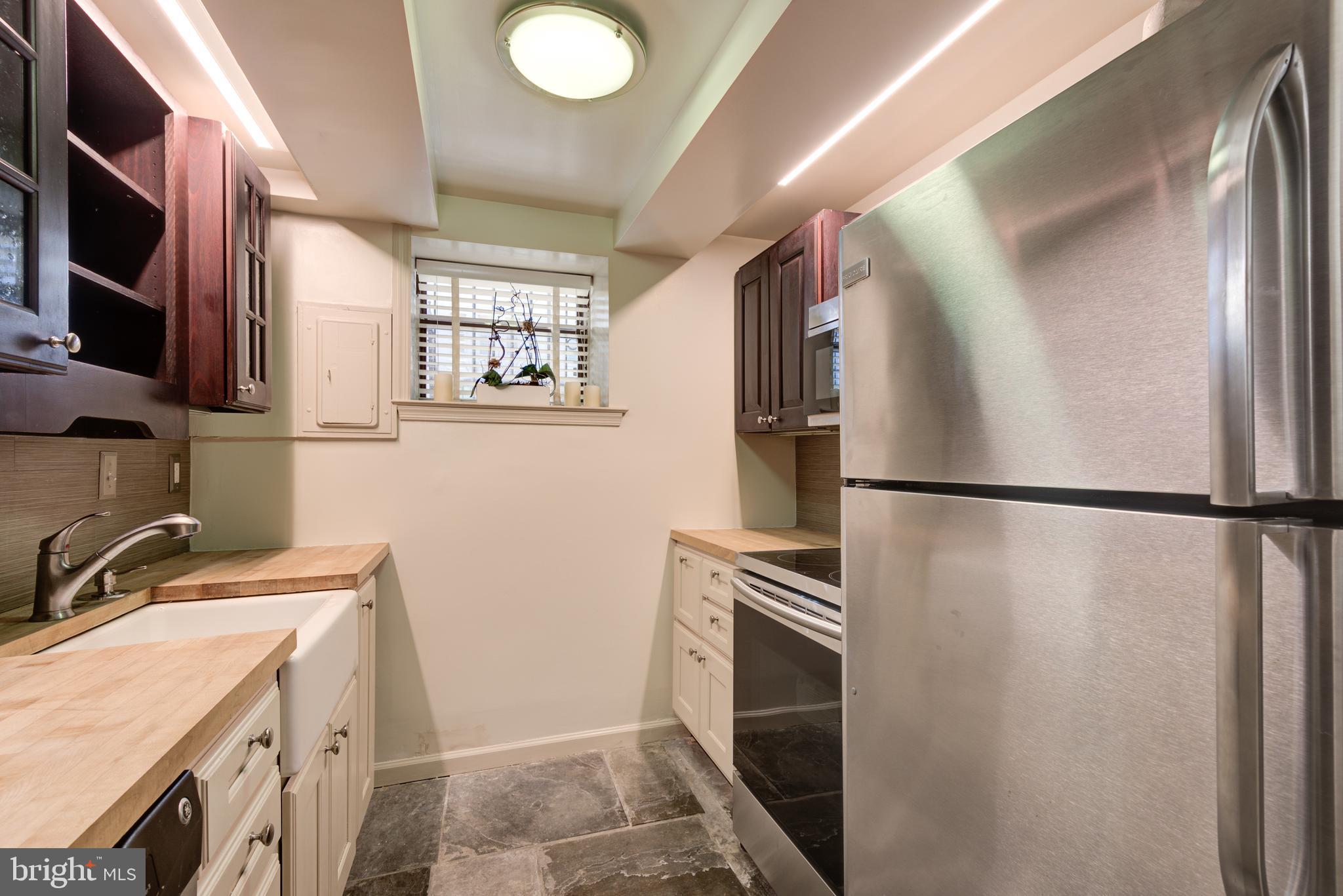 2001 16th Street Northwest, Unit B4 Washington, DC 20009 - Photo 25 of 38 Galley Kitchen, lots of recessed lighting.