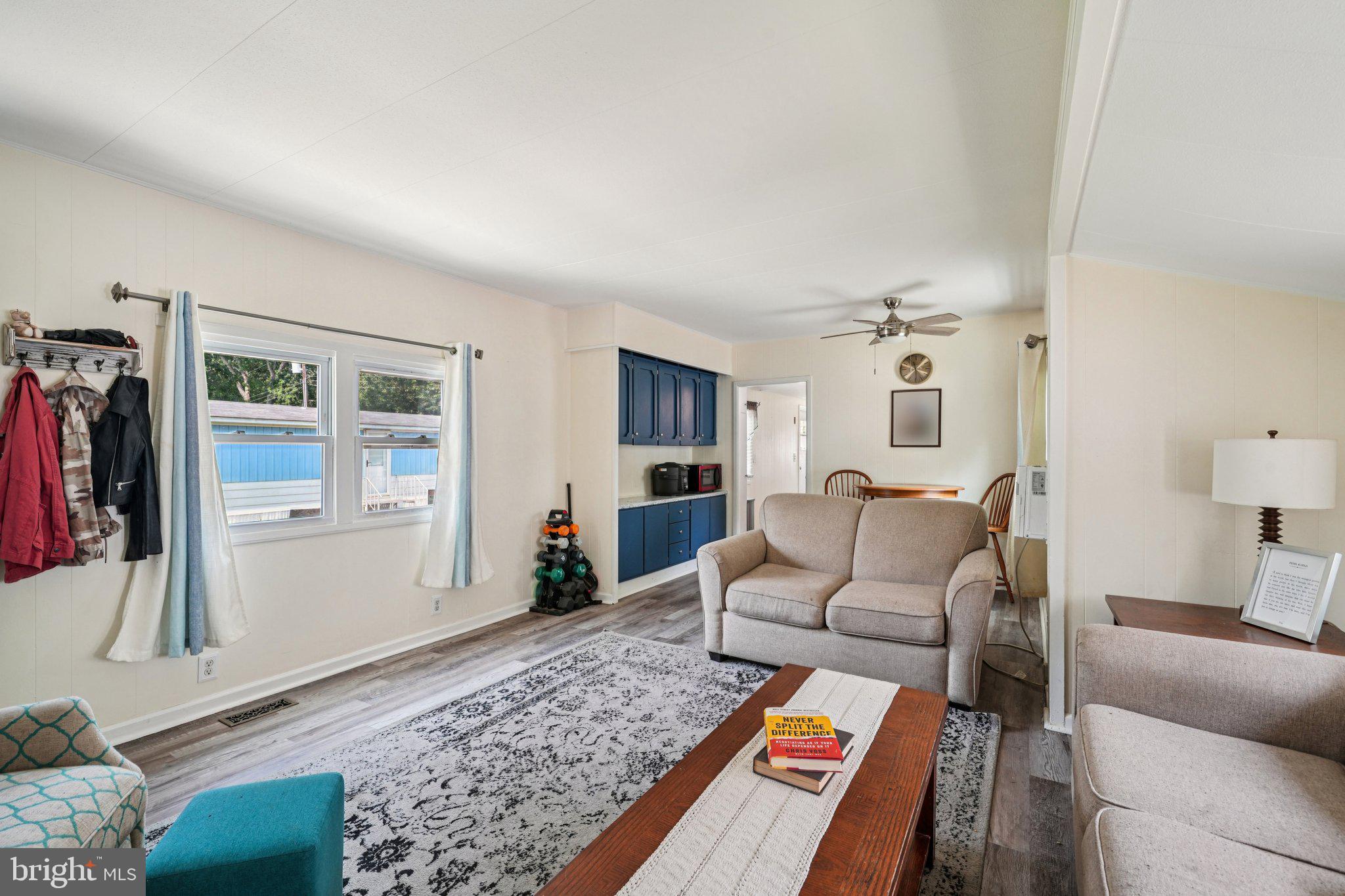 2528 Tilton Road, Unit 421 Egg Harbor Township, NJ 08234 - Photo 11 of 31 a living room with furniture and a rug