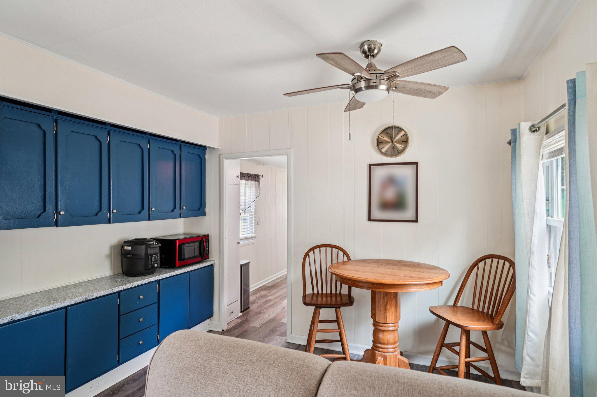 2528 Tilton Road, Unit 421 Egg Harbor Township, NJ 08234 - Photo 13 of 31 a kitchen with a refrigerator a sink and cabinets
