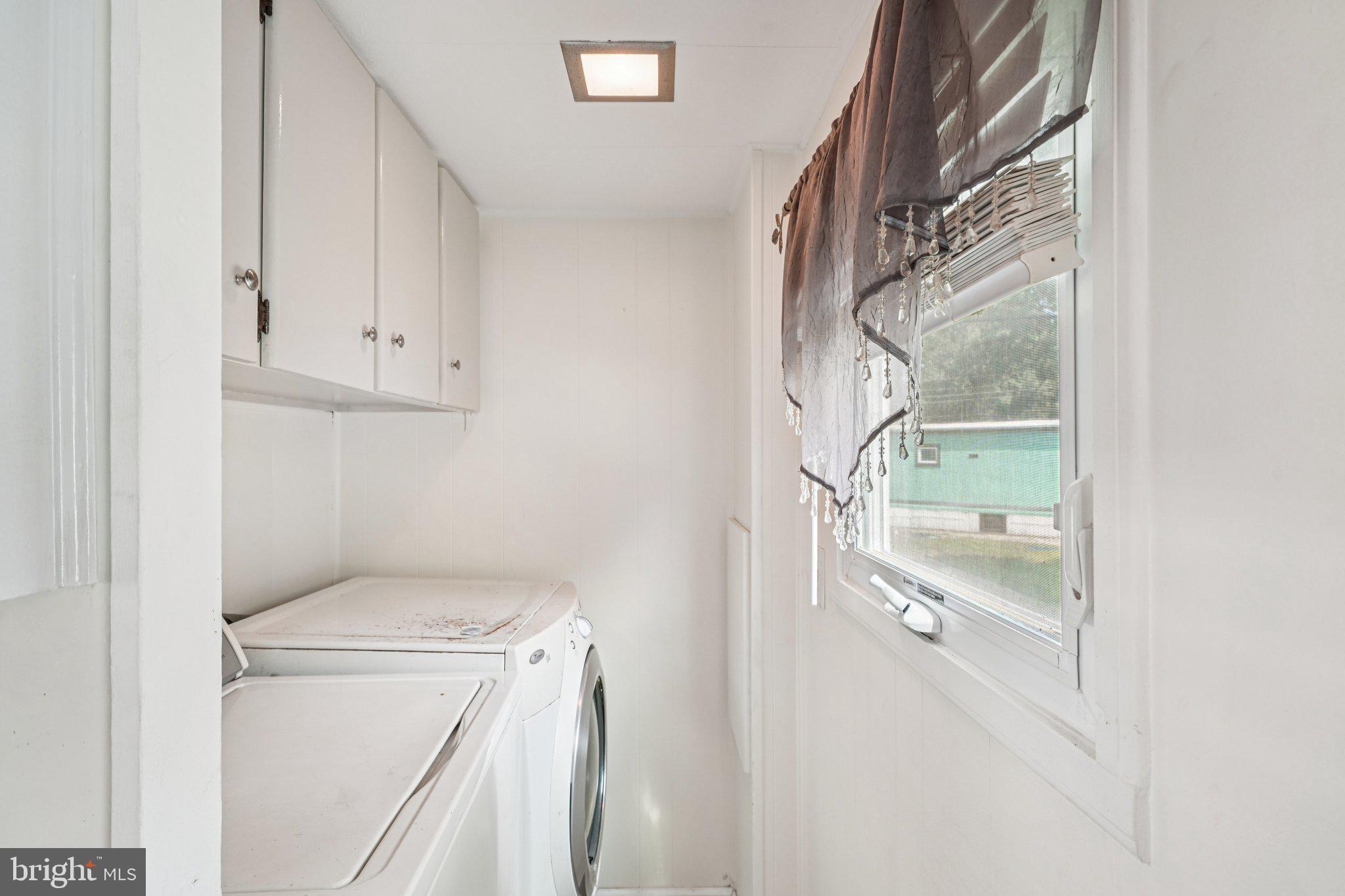2528 Tilton Road, Unit 421 Egg Harbor Township, NJ 08234 - Photo 20 of 31 a utility room with dryer and washer
