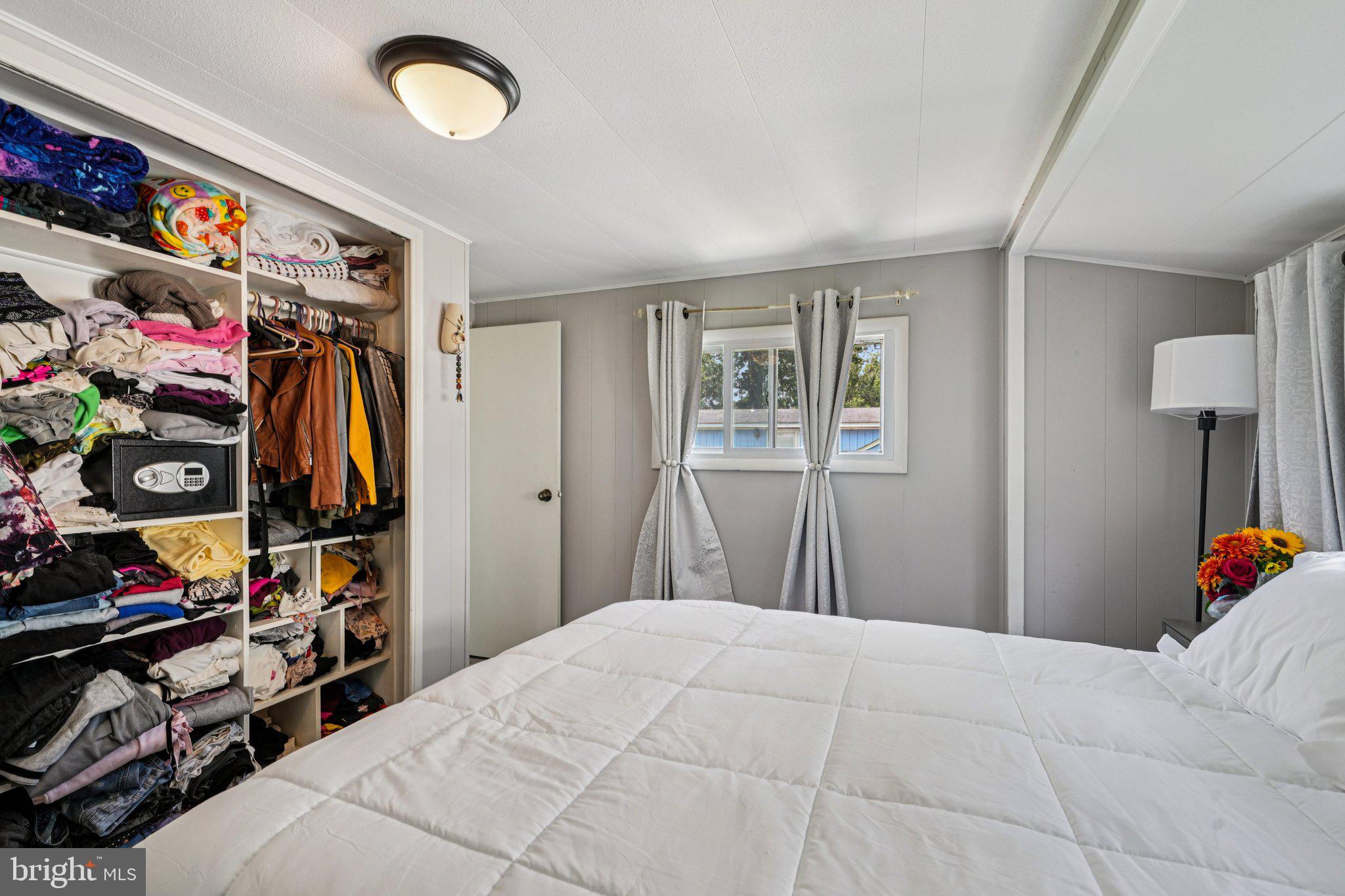 2528 Tilton Road, Unit 421 Egg Harbor Township, NJ 08234 - Photo 21 of 31 a bedroom with a bed and a window