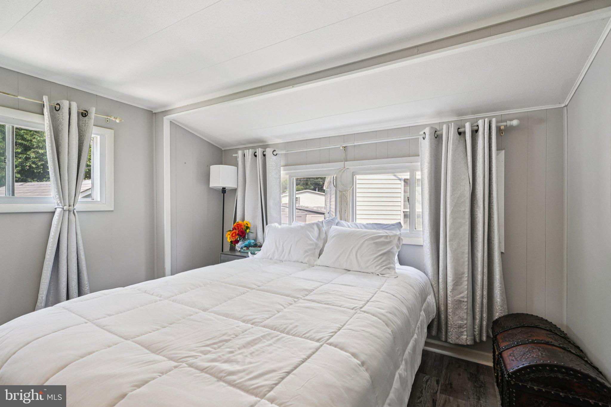2528 Tilton Road, Unit 421 Egg Harbor Township, NJ 08234 - Photo 22 of 31 a bedroom with a bed and a window