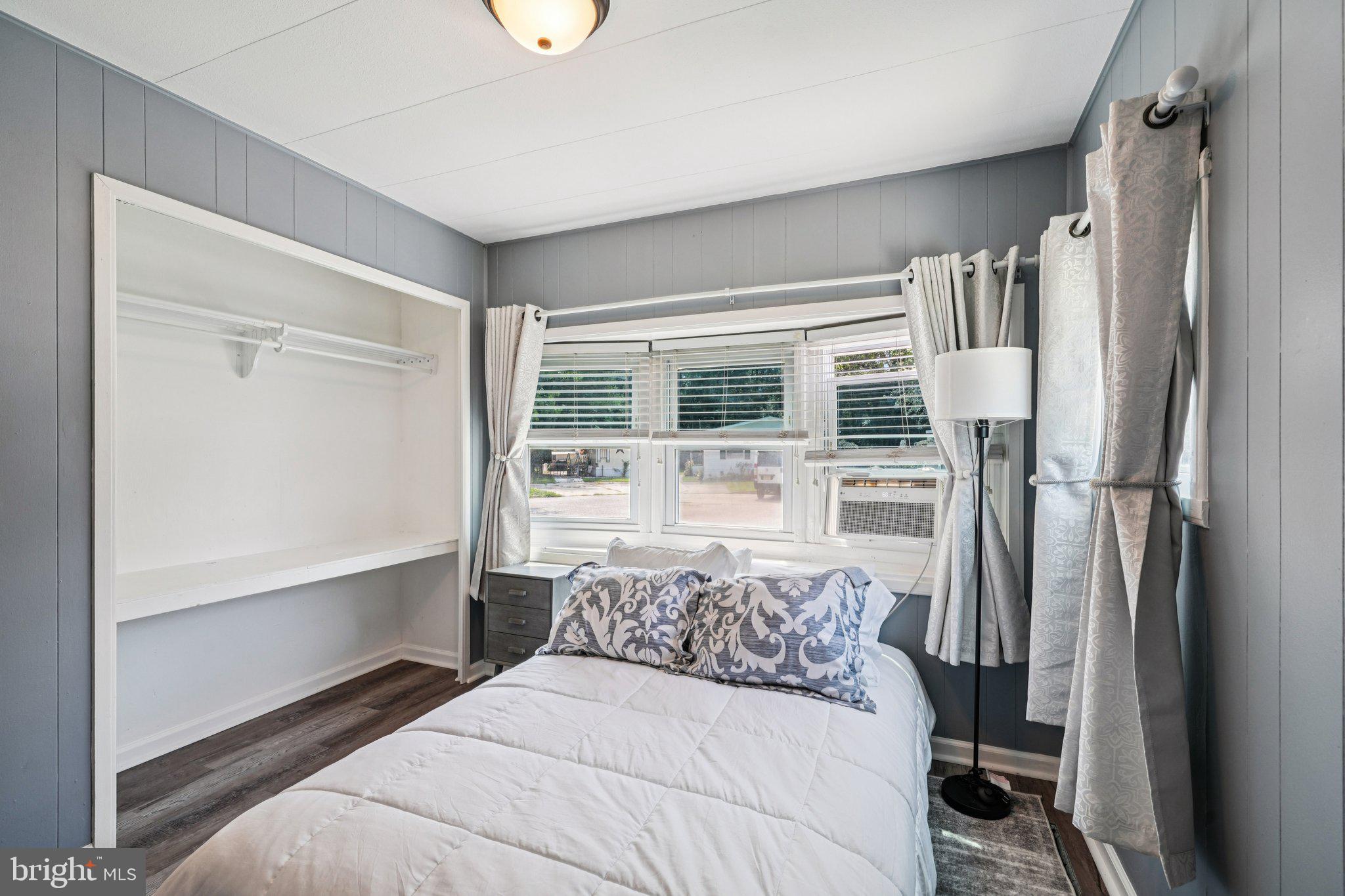 2528 Tilton Road, Unit 421 Egg Harbor Township, NJ 08234 - Photo 28 of 31 a bedroom with a bed and a window