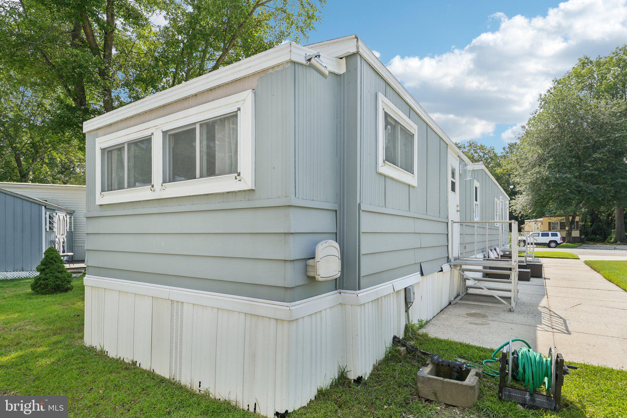 2528 Tilton Road, Unit 421 Egg Harbor Township, NJ 08234 - Photo 30 of 31 a view of house with backyard and garden