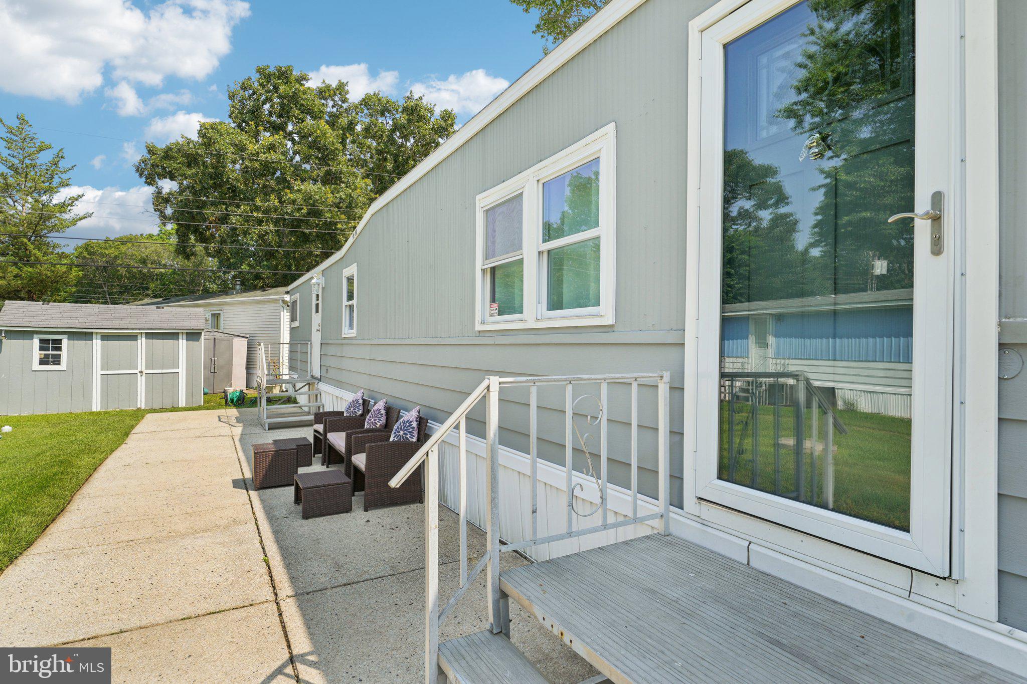 2528 Tilton Road, Unit 421 Egg Harbor Township, NJ 08234 - Photo 4 of 31 a view of house with backyard and sitting area
