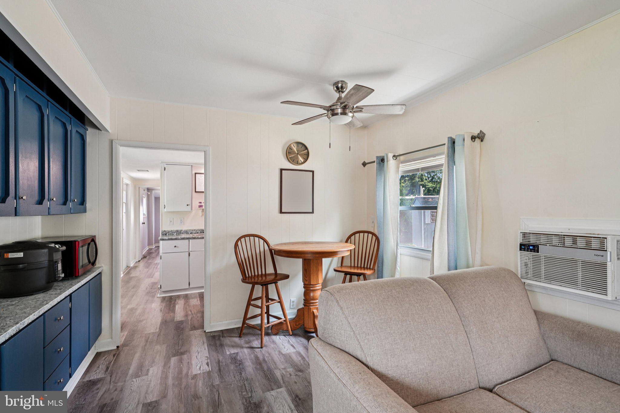 2528 Tilton Road, Unit 421 Egg Harbor Township, NJ 08234 - Photo 7 of 31 a living room with furniture and wooden floor