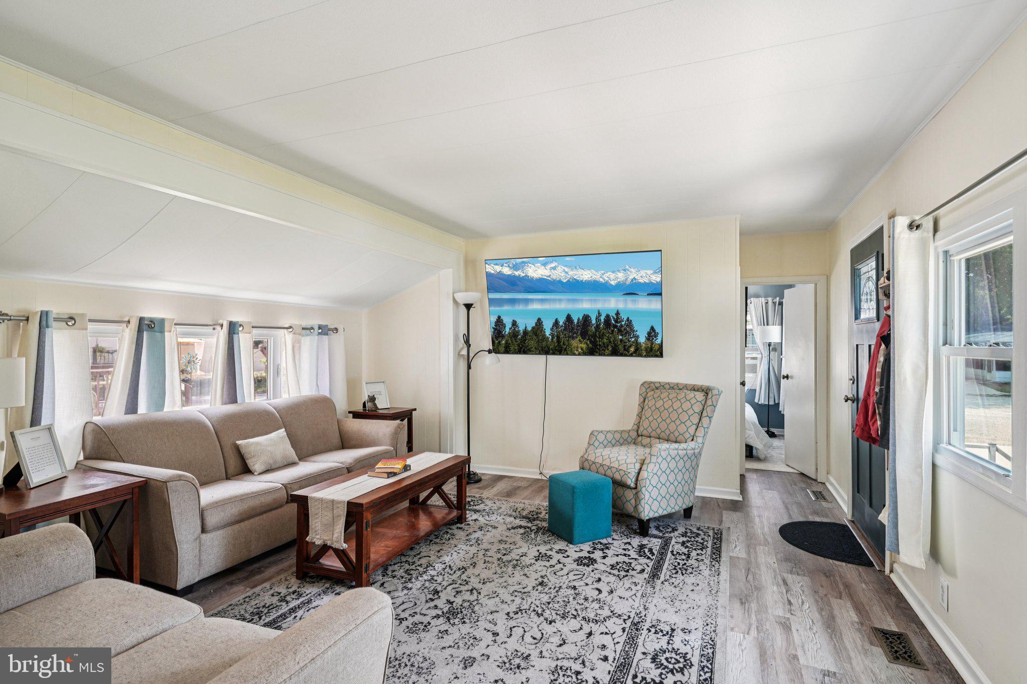 2528 Tilton Road, Unit 421 Egg Harbor Township, NJ 08234 - Photo 8 of 31 a living room with furniture and a rug